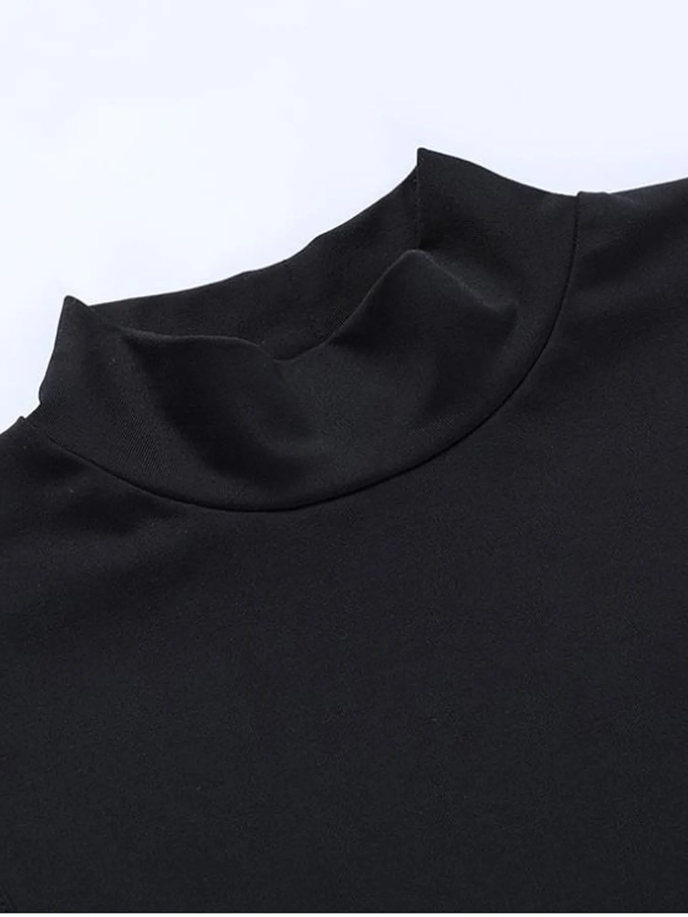 Sleeveless bodycon dress with hollow out sides and double high slit black party dress closeup fabric