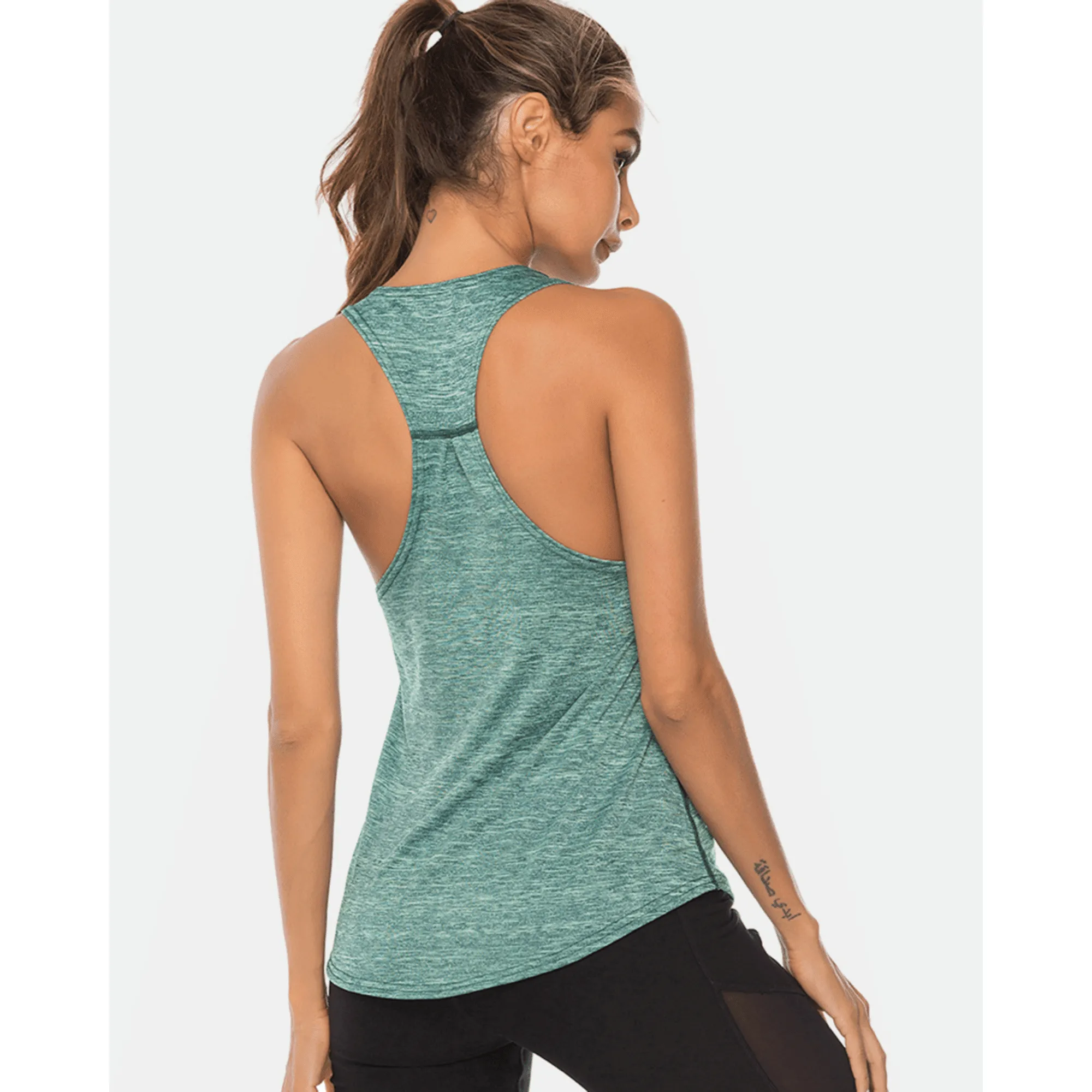 Angled back view of a teal long workout tank top with racerback straps.