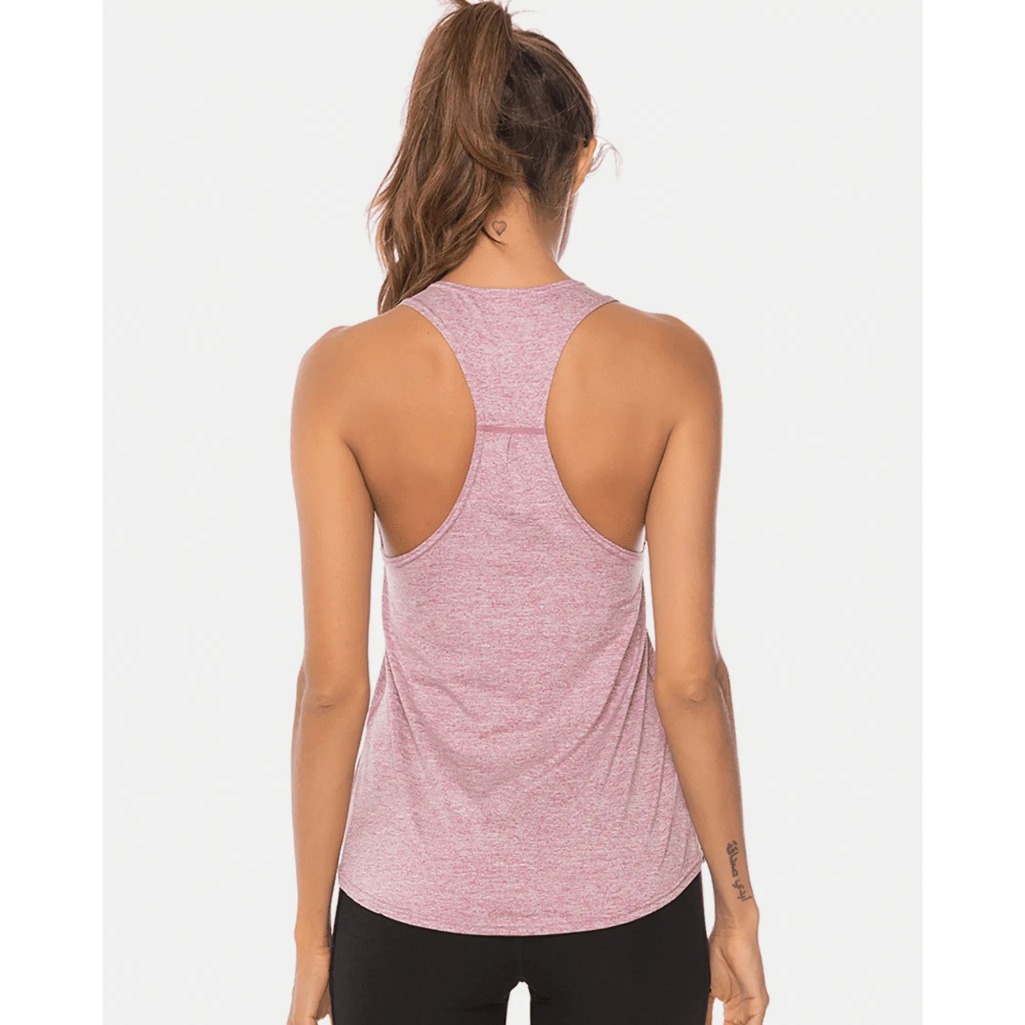 Back view of a light pink longline workout tank top with racerback straps.